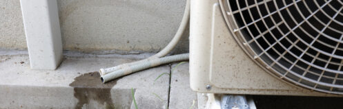 Drainage piping for condensed water attached to the air conditioner.