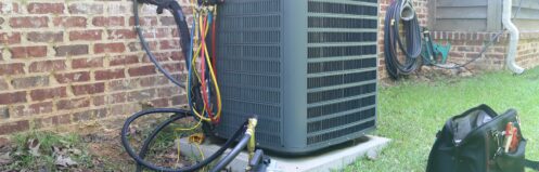 Air conditioner being serviced