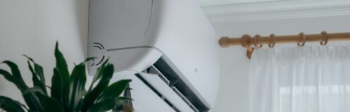 Wall-mounted ductless mini-split inside the living room of a home