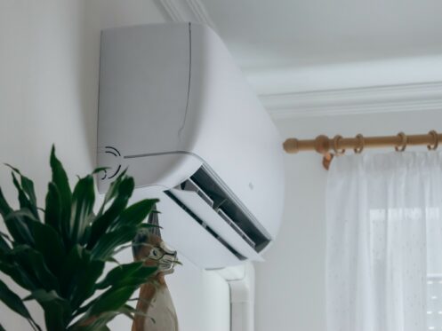 Wall-mounted ductless mini-split inside the living room of a home